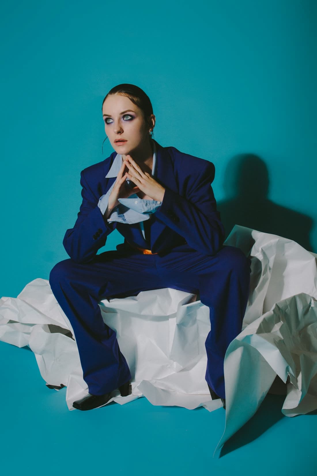Model in a cobalt suit